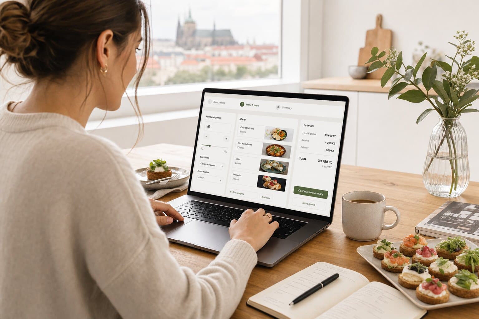 Person building a catering menu in an online calculator on a laptop